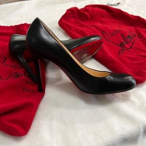 Christian Louboutin black pumps